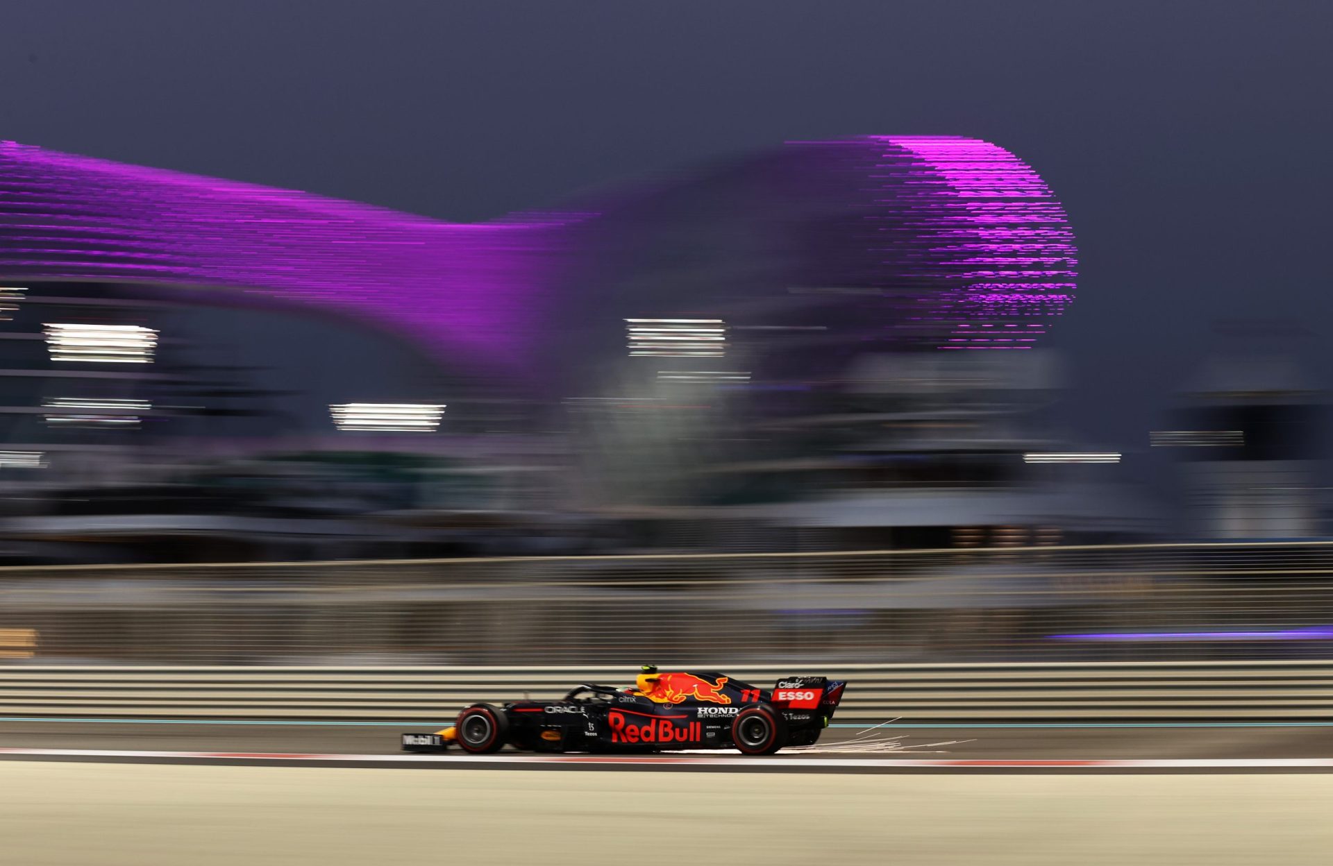 ABU DHABI, UNITED ARAB EMIRATES - DECEMBER 11: Sergio Perez of Mexico driving the (11) Red Bull Racing RB16B Honda during qualifying ahead of the F1 Grand Prix of Abu Dhabi at Yas Marina Circuit on December 11, 2021 in Abu Dhabi, United Arab Emirates. (Photo by Lars Baron/Getty Images) // Getty Images / Red Bull Content Pool  // SI202112110222 // Usage for editorial use only //