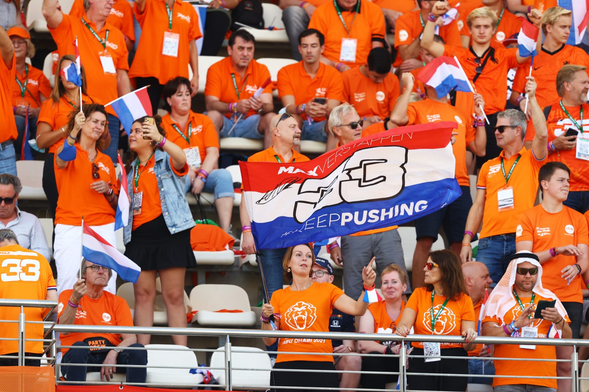 ABU DHABI, UNITED ARAB EMIRATES - DECEMBER 12: Max Verstappen of Netherlands and Red Bull Racing fans show their support during the F1 Grand Prix of Abu Dhabi at Yas Marina Circuit on December 12, 2021 in Abu Dhabi, United Arab Emirates. (Photo by Bryn Lennon/Getty Images) // Getty Images / Red Bull Content Pool  // SI202112120166 // Usage for editorial use only //