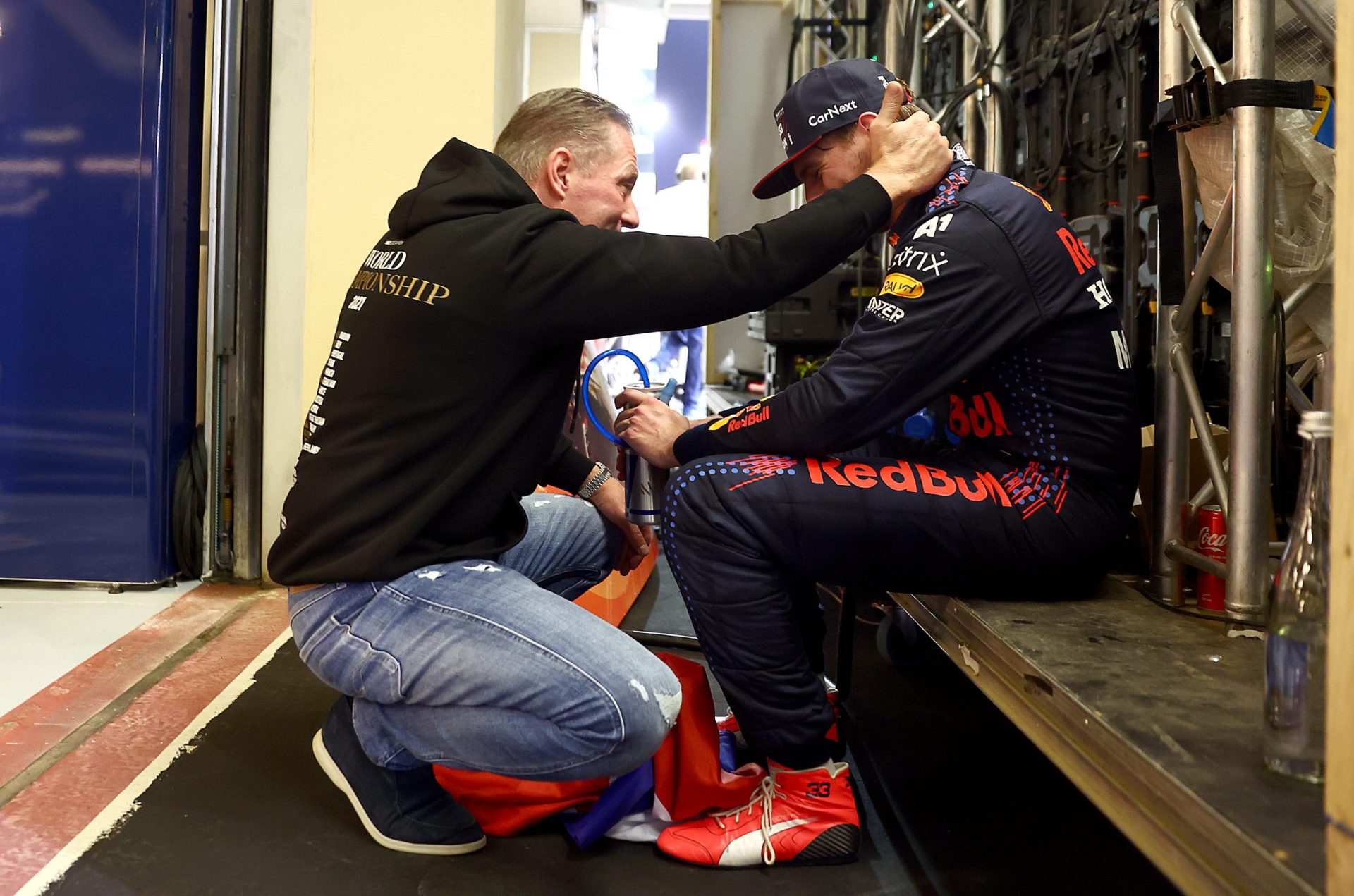 ABU DHABI, UNITED ARAB EMIRATES - DECEMBER 12: Race winner and 2021 F1 World Drivers Champion Max Verstappen of Netherlands and Red Bull Racing celebrates with his father Jos Verstappen in parc ferme during the F1 Grand Prix of Abu Dhabi at Yas Marina Circuit on December 12, 2021 in Abu Dhabi, United Arab Emirates. (Photo by Mark Thompson/Getty Images) // Getty Images / Red Bull Content Pool  // SI202112120475 // Usage for editorial use only //